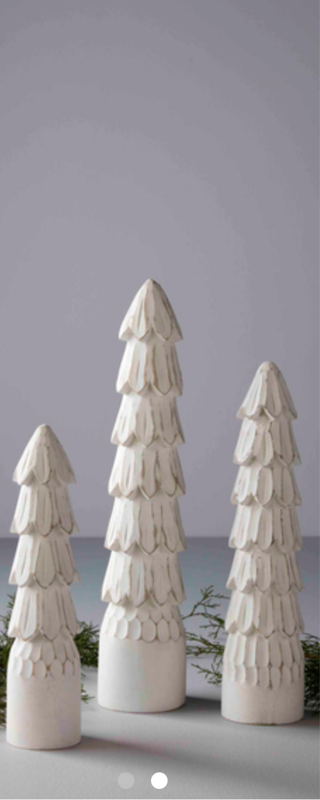 Carved white wood trees